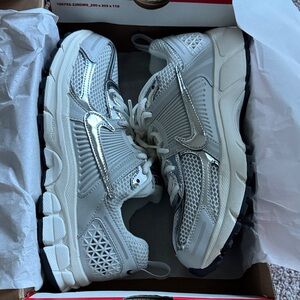Nike White and Metallic Silver Running Shoes